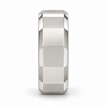[metal:white-gold] Alden Faceted Band — side-profile — Broad polished facets with bevelled edges and a smooth rounded interior, edge profile studio view [catalog-v4]