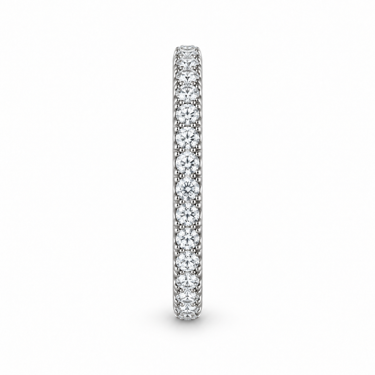 [metal:white-gold] Alouette Half-Pavé Ring — side-profile — Single-row half-pavé ring, edge profile studio view [catalog-v4]