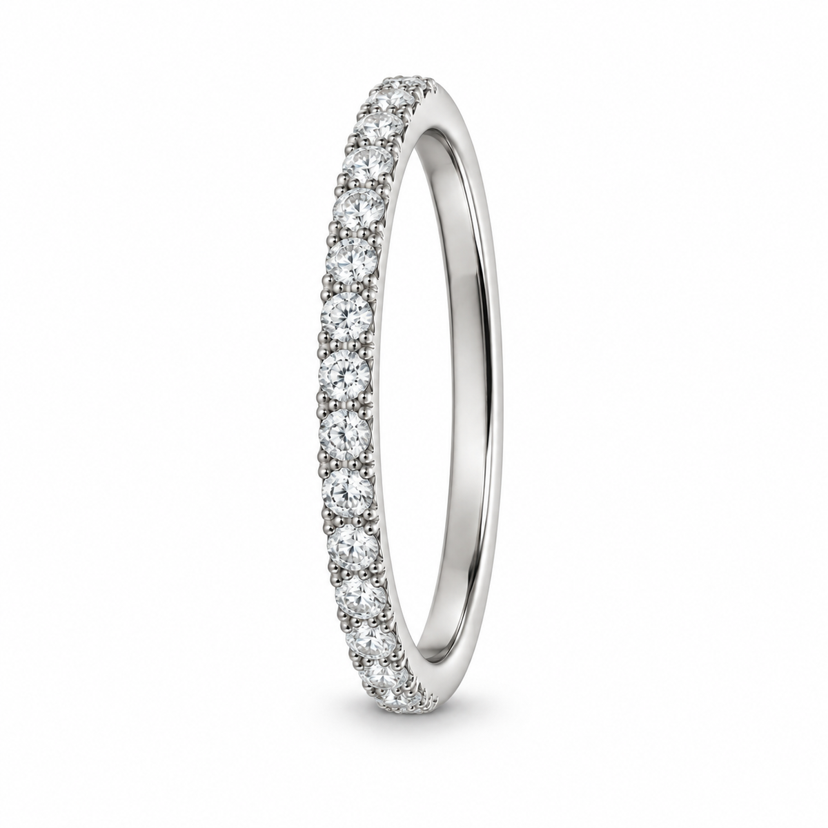 [metal:white-gold] Alouette Half-Pavé Ring — three-quarter — Single-row half-pavé ring, standing oblique studio view [catalog-v4]