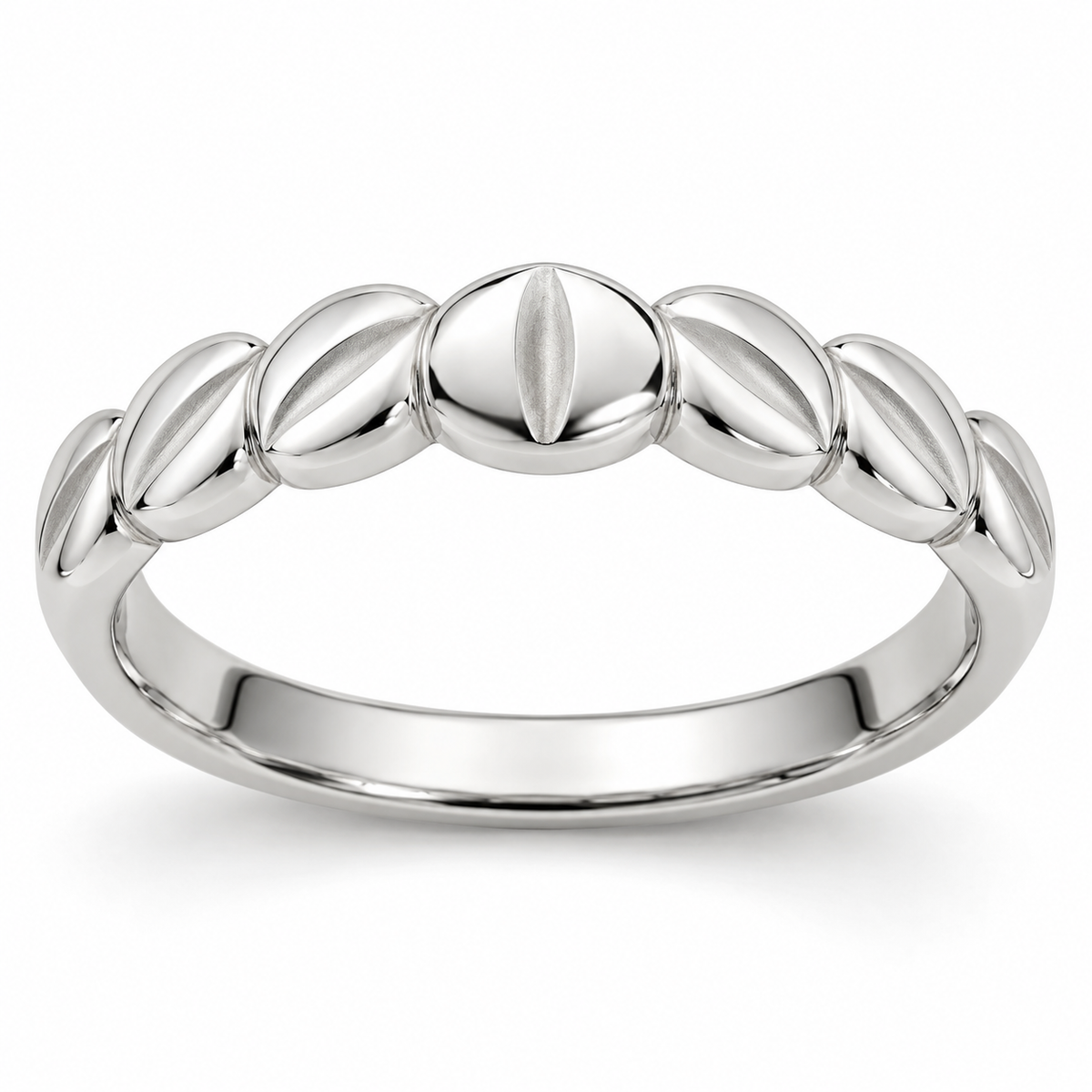 [metal:white-gold] Alysienne Lozenge Band — front — Womens slender closed continuous band made of seven gently puffed polished lozenge-shaped metal panels across top half, seamlessly joined to plain smooth lower band. Each lozenge has a narrow satin central depression. Circular comfort-fit bore, no diamonds. [catalog-v4]