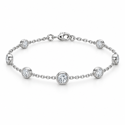 [metal:white-gold] Amara Bezel Bracelet — front — Bezel station bracelet, low oblique studio view [catalog-v4]