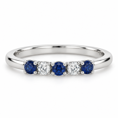 [metal:white-gold] Amelie Sapphire Accent Band — front — slender polished band with five round stones across front ordered blue sapphire white diamond blue sapphire white diamond blue sapphire, front view [catalog-v4]