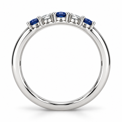 [metal:white-gold] Amelie Sapphire Accent Band — top — slender polished band with five round stones across front ordered blue sapphire white diamond blue sapphire white diamond blue sapphire, top view [catalog-v4]