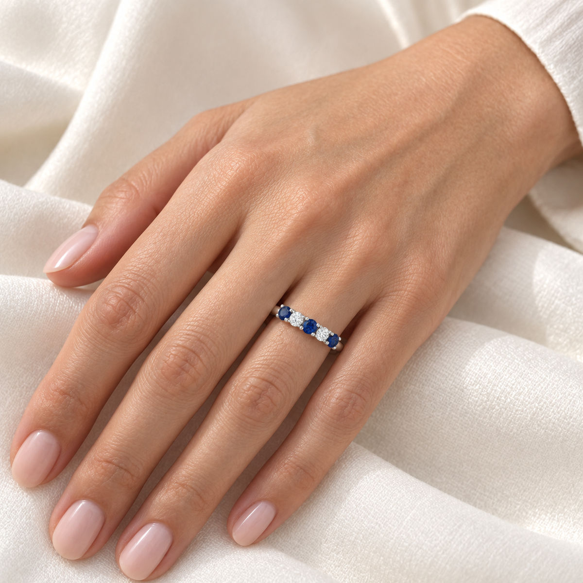 [metal:all] Amelie Sapphire Accent Band — worn — Human-worn styling illustration [catalog-v4]