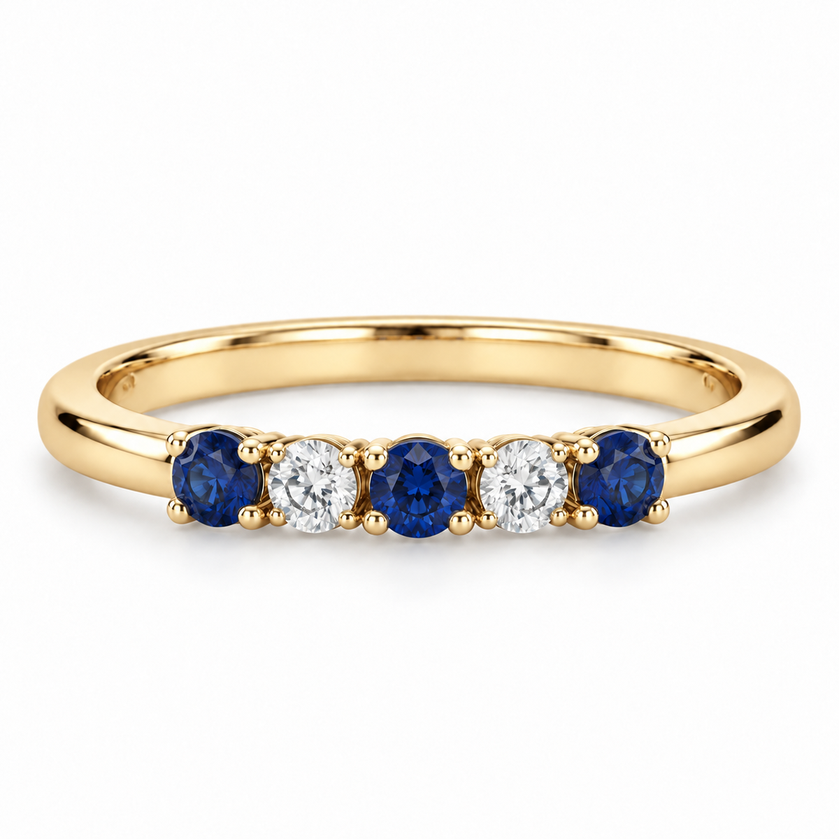 [metal:yellow-gold] Amelie Sapphire Accent Band — front — slender polished band with five round stones across front ordered blue sapphire white diamond blue sapphire white diamond blue sapphire, front view [catalog-v4]