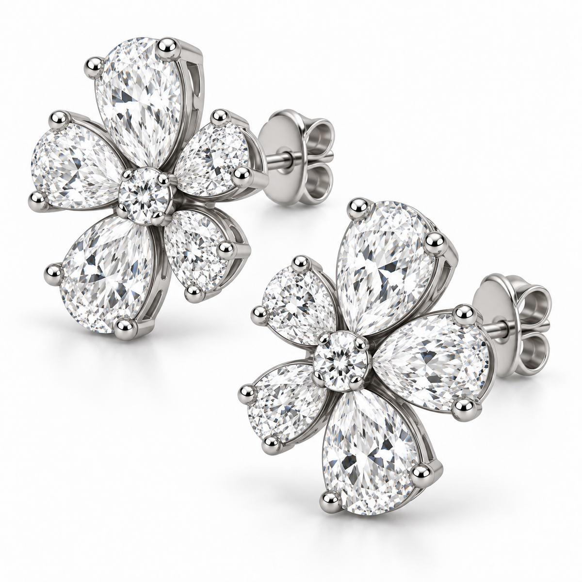 [metal:white-gold] Arabella Floral Earrings — three-quarter — Oblique view showing floral baskets and butterfly backs [catalog-v4]