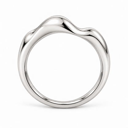 [metal:white-gold] Asteria Wave Ring — top — Asymmetric polished wave band, circular elevation studio view [catalog-v4]