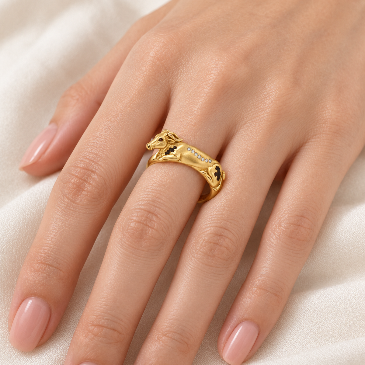 Aubrac Cow Ring — worn view — [metal:all]