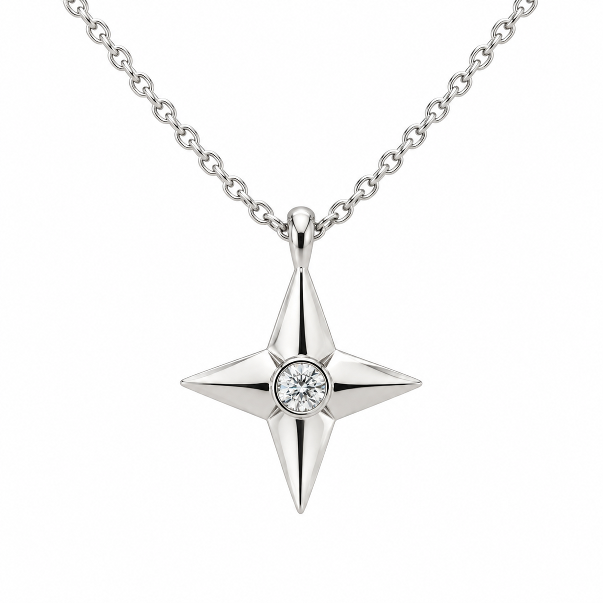 [metal:white-gold] Aurelie Compass Diamond Pendant — front — petite four-point compass-star pendant with one flush-set round diamond at centre on fine cable chain, front view [catalog-v4]