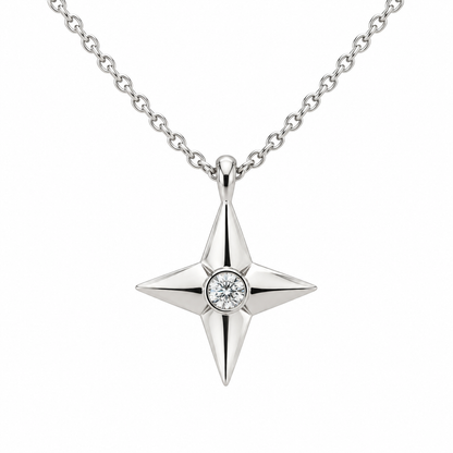 [metal:white-gold] Aurelie Compass Diamond Pendant — front — petite four-point compass-star pendant with one flush-set round diamond at centre on fine cable chain, front view [catalog-v4]
