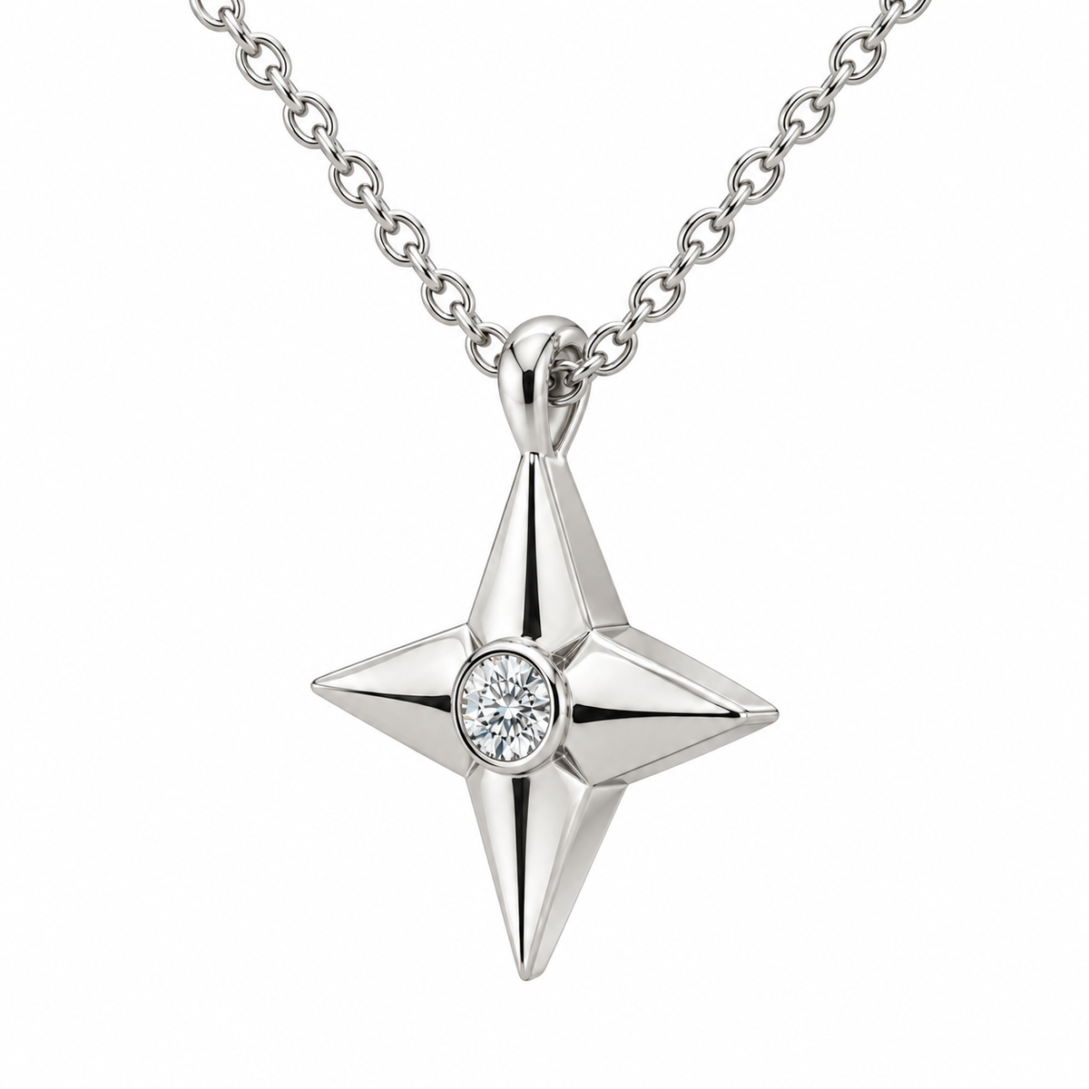 [metal:white-gold] Aurelie Compass Diamond Pendant — three-quarter — petite four-point compass-star pendant with one flush-set round diamond at centre on fine cable chain, three-quarter view [catalog-v4]