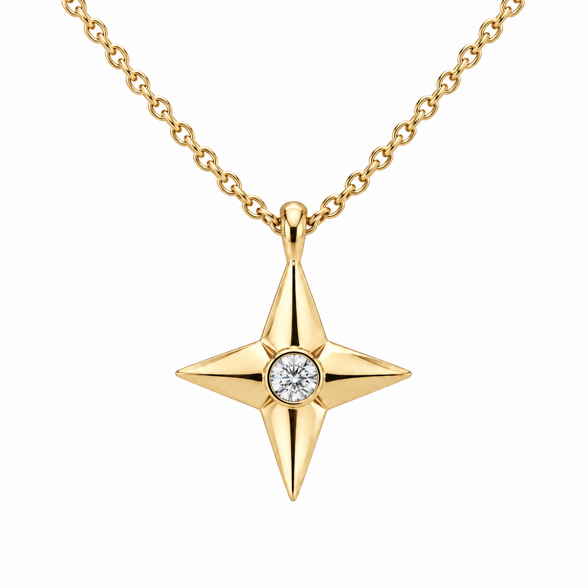 [metal:yellow-gold] Aurelie Compass Diamond Pendant — front — petite four-point compass-star pendant with one flush-set round diamond at centre on fine cable chain, front view [catalog-v4]