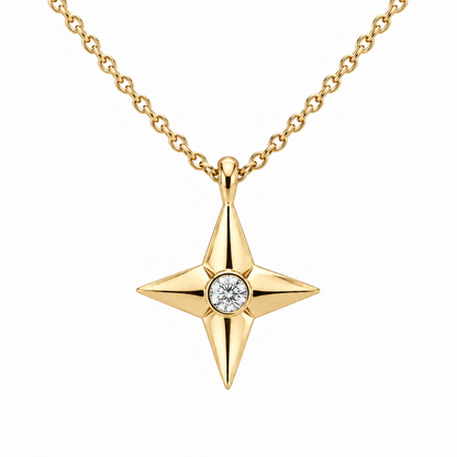 [metal:yellow-gold] Aurelie Compass Diamond Pendant — front — petite four-point compass-star pendant with one flush-set round diamond at centre on fine cable chain, front view [catalog-v4]
