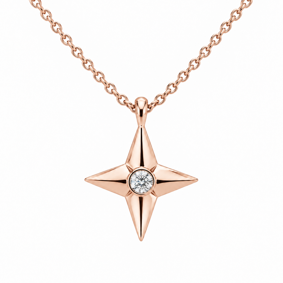[metal:rose-gold] Aurelie Compass Diamond Pendant — front — petite four-point compass-star pendant with one flush-set round diamond at centre on fine cable chain, front view [catalog-v4]