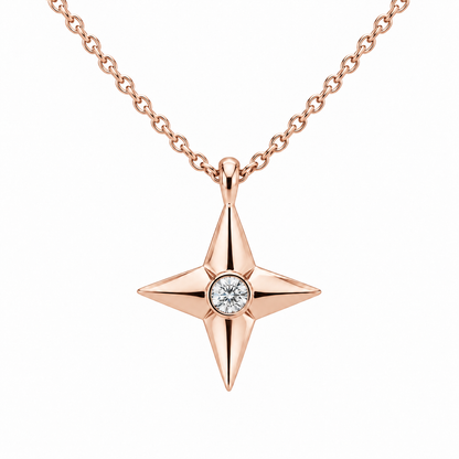 [metal:rose-gold] Aurelie Compass Diamond Pendant — front — petite four-point compass-star pendant with one flush-set round diamond at centre on fine cable chain, front view [catalog-v4]