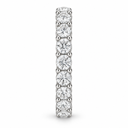 [metal:white-gold] Aveline Round Eternity Ring — side-profile — Shared-prong round diamond eternity ring, edge profile studio view [catalog-v4]