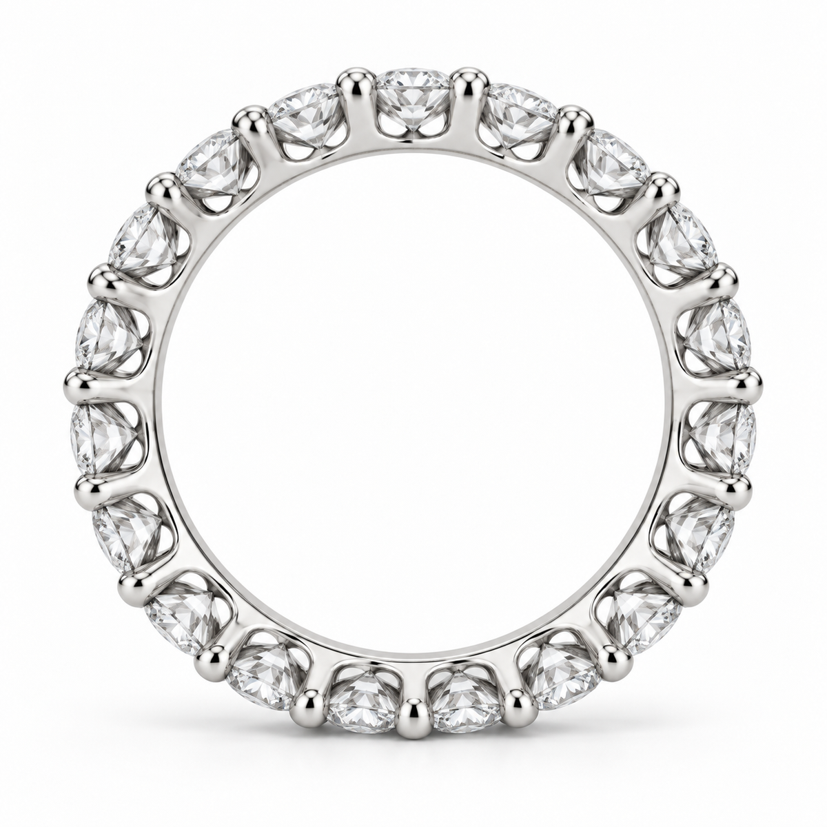[metal:white-gold] Aveline Round Eternity Ring — top — Shared-prong round diamond eternity ring, circular elevation studio view [catalog-v4]