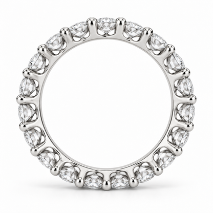 [metal:white-gold] Aveline Round Eternity Ring — top — Shared-prong round diamond eternity ring, circular elevation studio view [catalog-v4]
