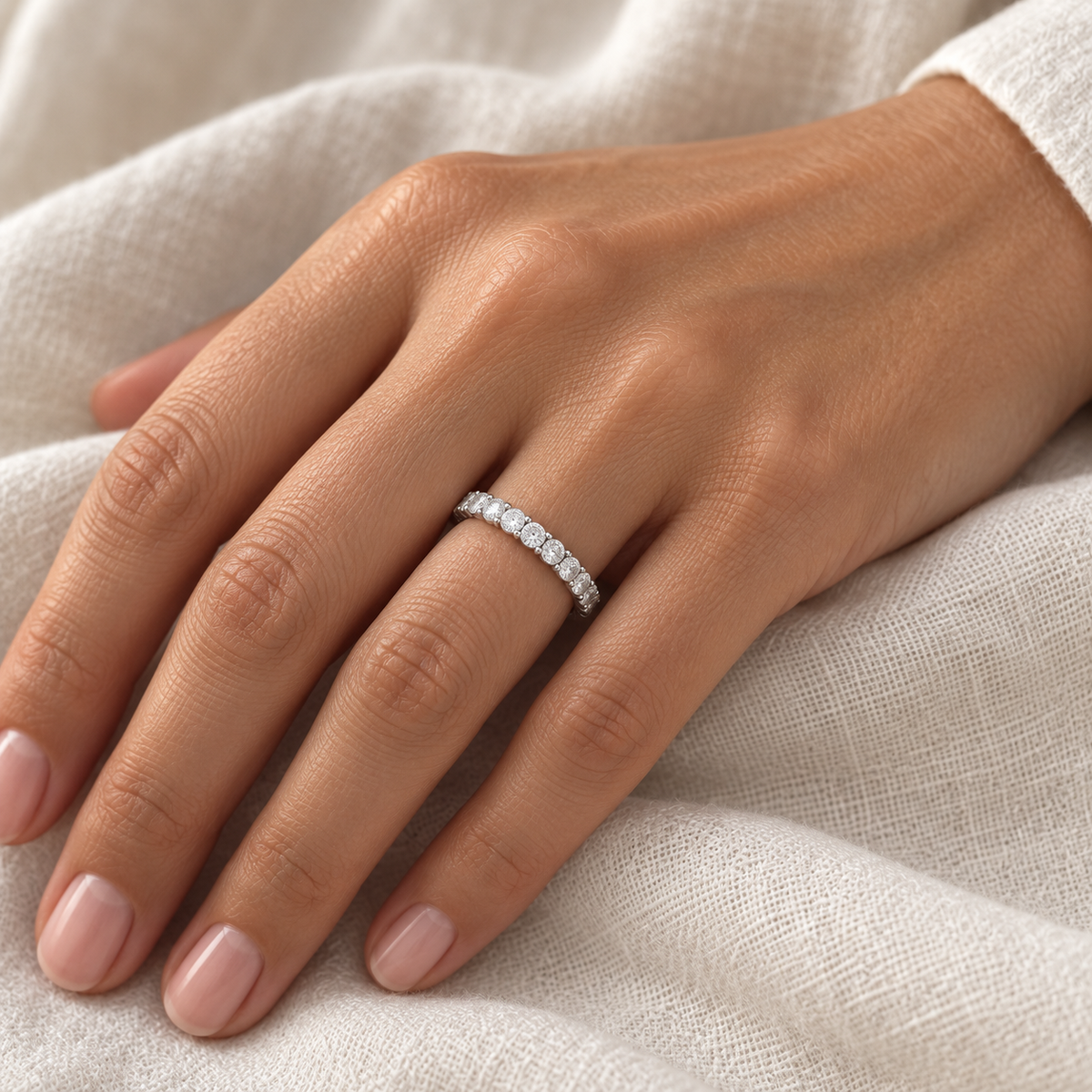 [metal:all] Aveline Round Eternity Ring — worn — Human-worn styling illustration [catalog-v4]
