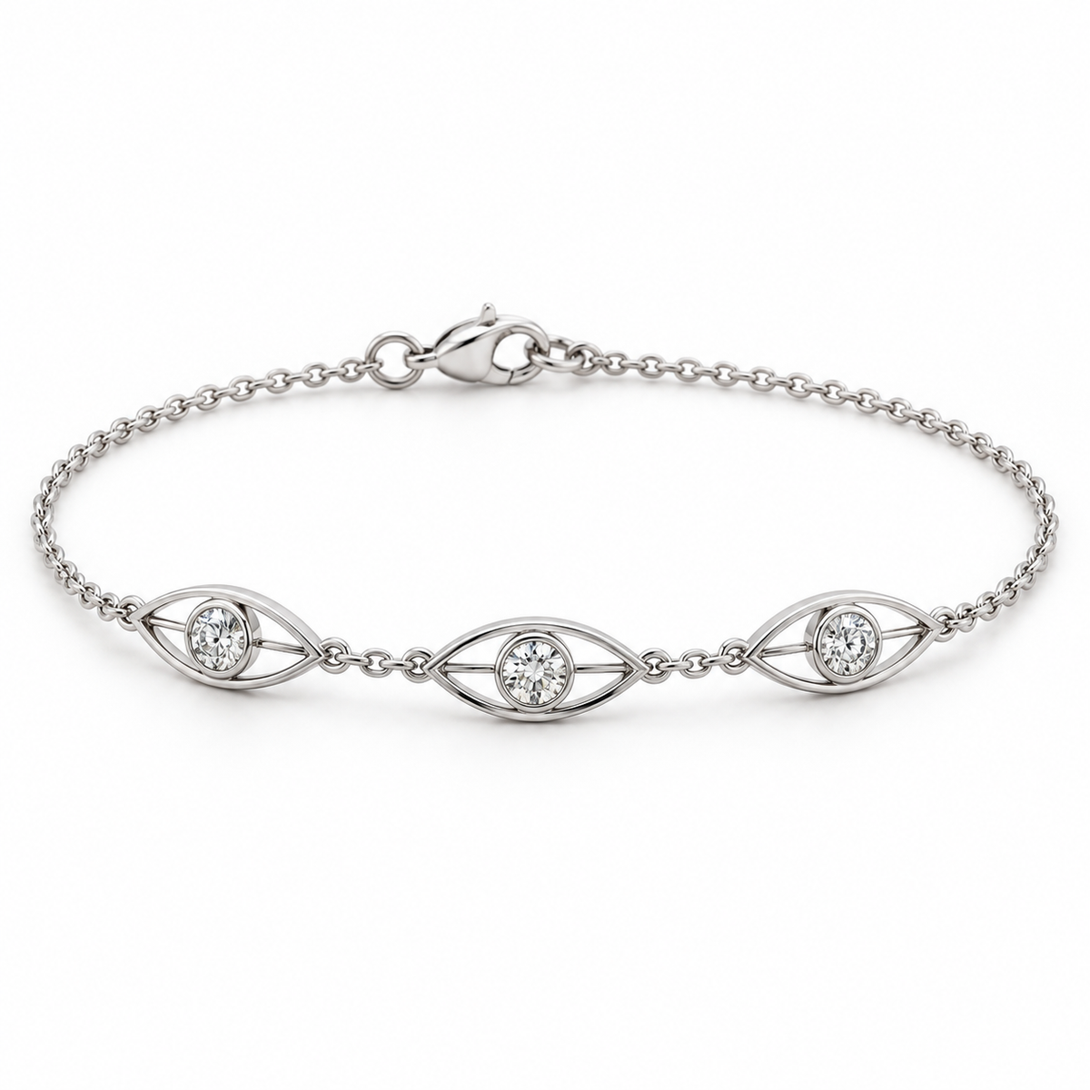 [metal:white-gold] Avenisse Lens Station Bracelet — front — Fine cable chain with exactly three slim east-west open pointed-oval lens frames. Each frame contains one round diamond in a small circular bezel at its centre, joined to lens ends by short metal bars. Three frames evenly spaced at front, lobster clasp at rear. [catalog-v4]