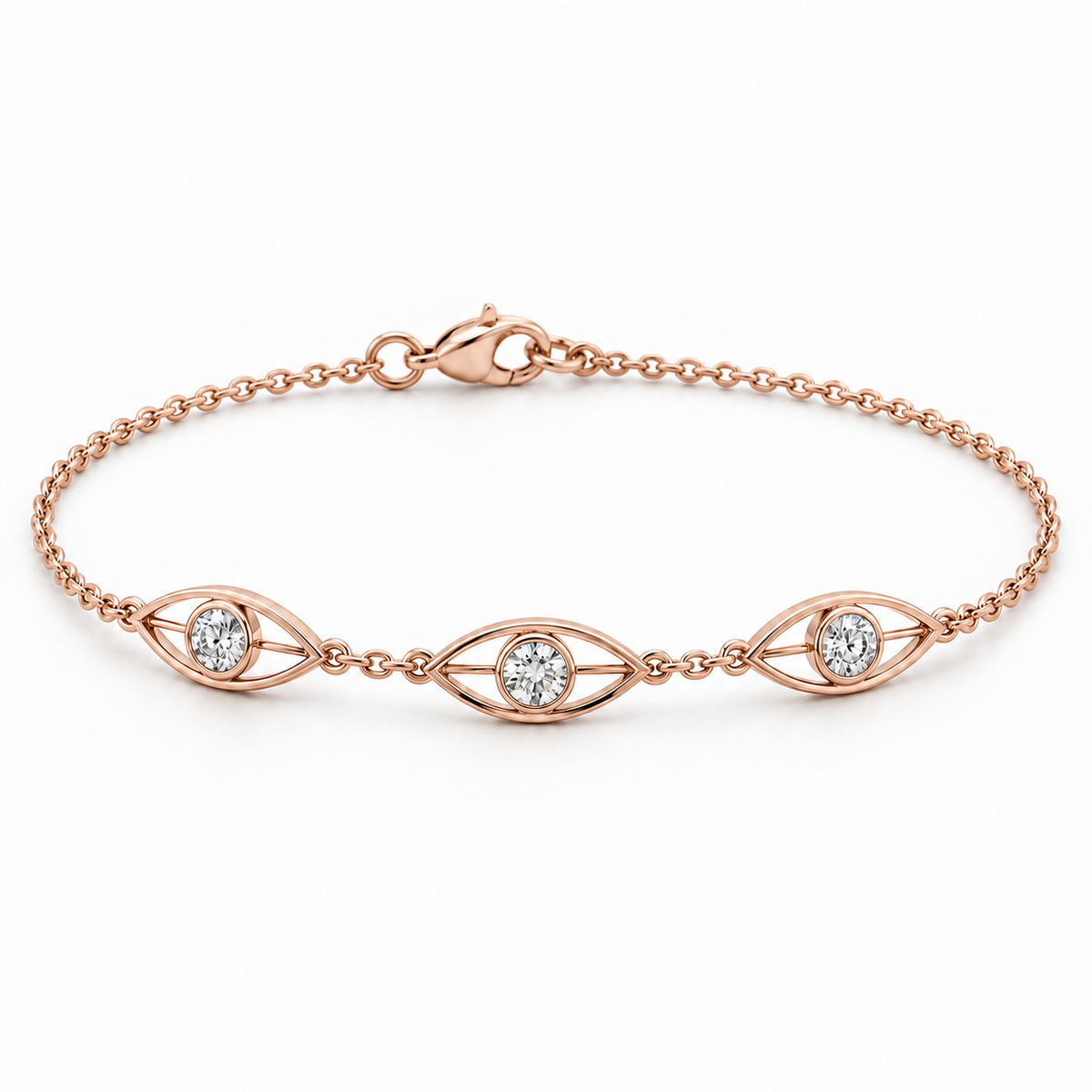 [metal:rose-gold] Avenisse Lens Station Bracelet — front — Fine cable chain with exactly three slim east-west open pointed-oval lens frames. Each frame contains one round diamond in a small circular bezel at its centre, joined to lens ends by short metal bars. Three frames evenly spaced at front, lobster clasp at rear. [catalog-v4]