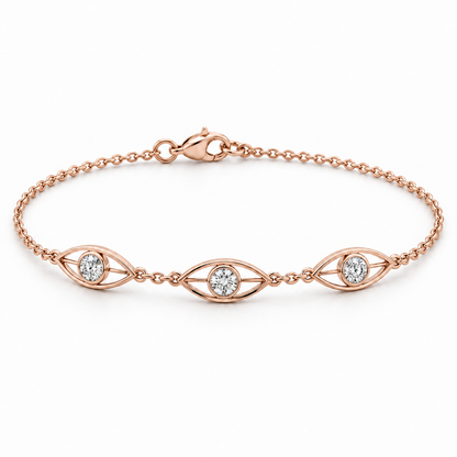 [metal:rose-gold] Avenisse Lens Station Bracelet — front — Fine cable chain with exactly three slim east-west open pointed-oval lens frames. Each frame contains one round diamond in a small circular bezel at its centre, joined to lens ends by short metal bars. Three frames evenly spaced at front, lobster clasp at rear. [catalog-v4]