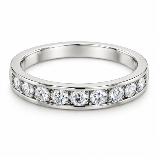 [metal:white-gold] Bellecour Channel Diamond Ring — front — Channel-set round diamond half band, shallow front studio view [catalog-v4]