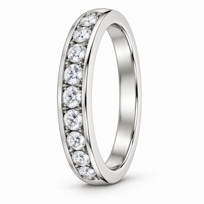 [metal:white-gold] Bellecour Channel Diamond Ring — three-quarter — Channel-set round diamond half band, standing oblique studio view [catalog-v4]
