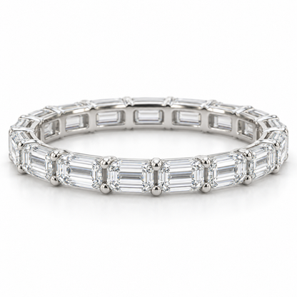 [metal:white-gold] Brielle Emerald Eternity Ring — front — East-west emerald-cut diamond eternity ring, shallow front studio view [catalog-v4]