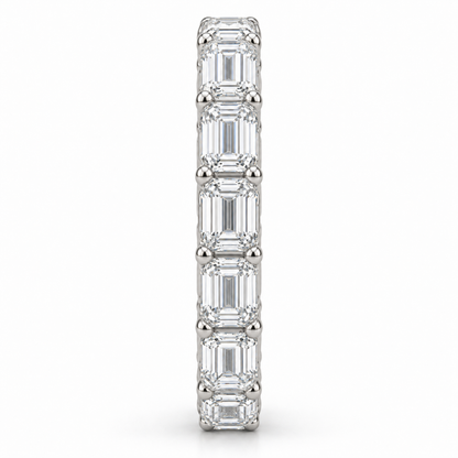 [metal:white-gold] Brielle Emerald Eternity Ring — side-profile — East-west emerald-cut diamond eternity ring, edge profile studio view [catalog-v4]