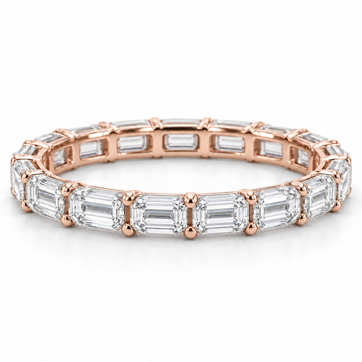 [metal:rose-gold] Brielle Emerald Eternity Ring — front — Rose gold colour preview [catalog-v4]