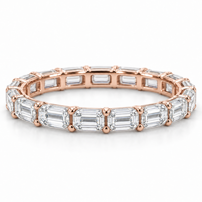 [metal:rose-gold] Brielle Emerald Eternity Ring — front — Rose gold colour preview [catalog-v4]