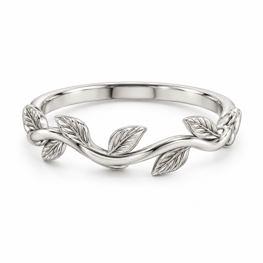 [metal:white-gold] Briony Botanical Ring — front — Sculpted vine band with leaf details, shallow front studio view [catalog-v4]
