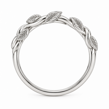 [metal:white-gold] Briony Botanical Ring — top — Sculpted vine band with leaf details, circular elevation studio view [catalog-v4]