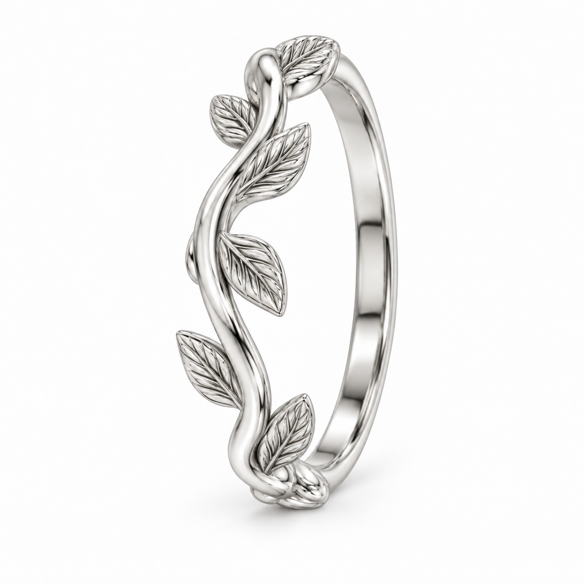 [metal:white-gold] Briony Botanical Ring — three-quarter — Sculpted vine band with leaf details, standing oblique studio view [catalog-v4]