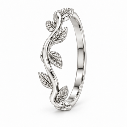 [metal:white-gold] Briony Botanical Ring — three-quarter — Sculpted vine band with leaf details, standing oblique studio view [catalog-v4]