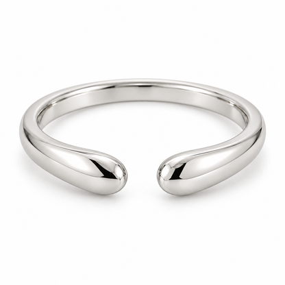 [metal:white-gold] Calista Open Ring — front — Open band with tapered rounded ends, shallow front studio view [catalog-v4]