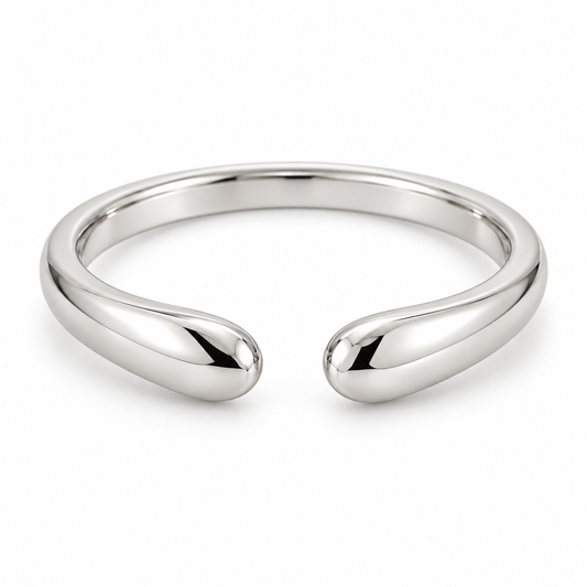 [metal:white-gold] Calista Open Ring — front — Open band with tapered rounded ends, shallow front studio view [catalog-v4]