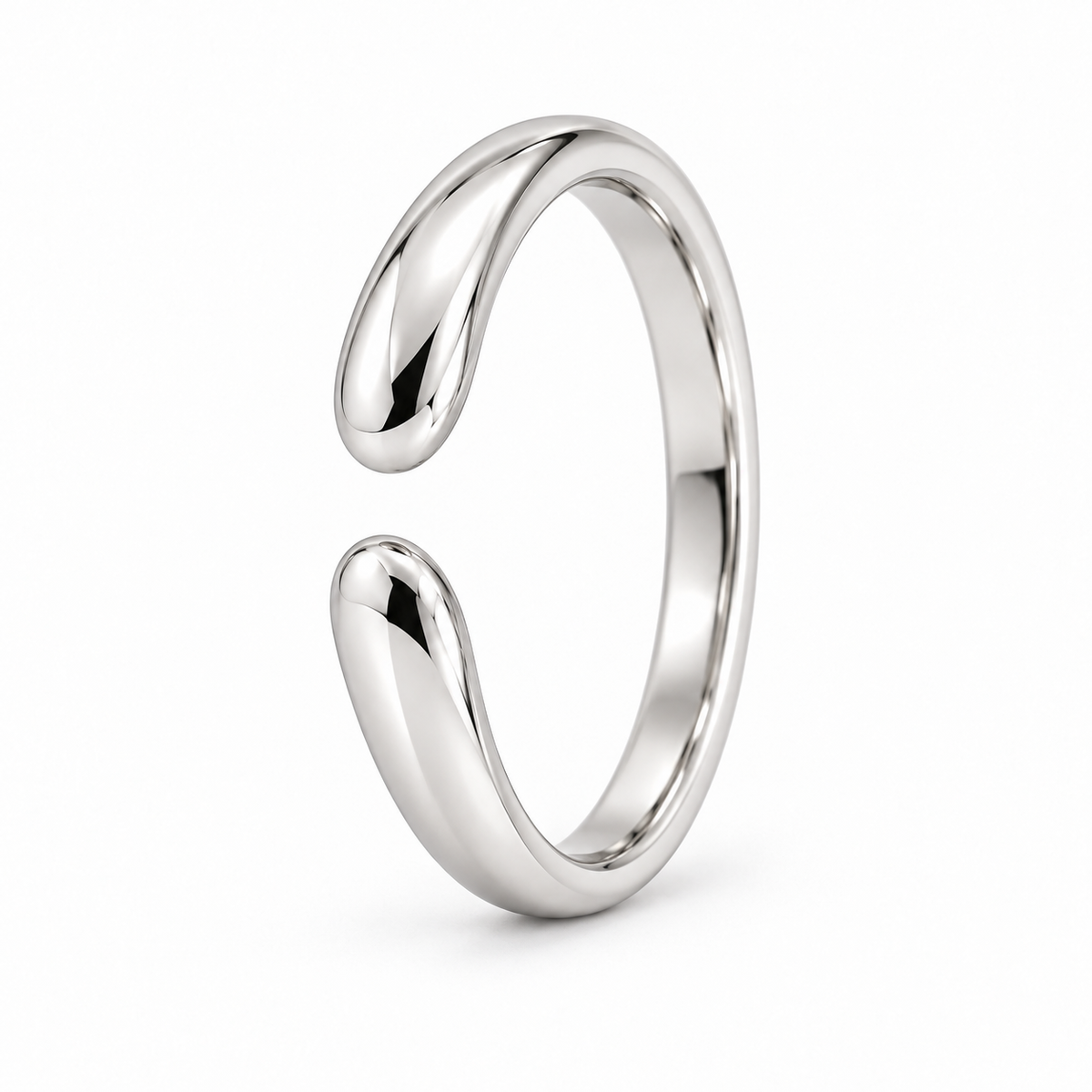 [metal:white-gold] Calista Open Ring — three-quarter — Open band with tapered rounded ends, standing oblique studio view [catalog-v4]