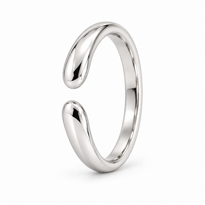 [metal:white-gold] Calista Open Ring — three-quarter — Open band with tapered rounded ends, standing oblique studio view [catalog-v4]