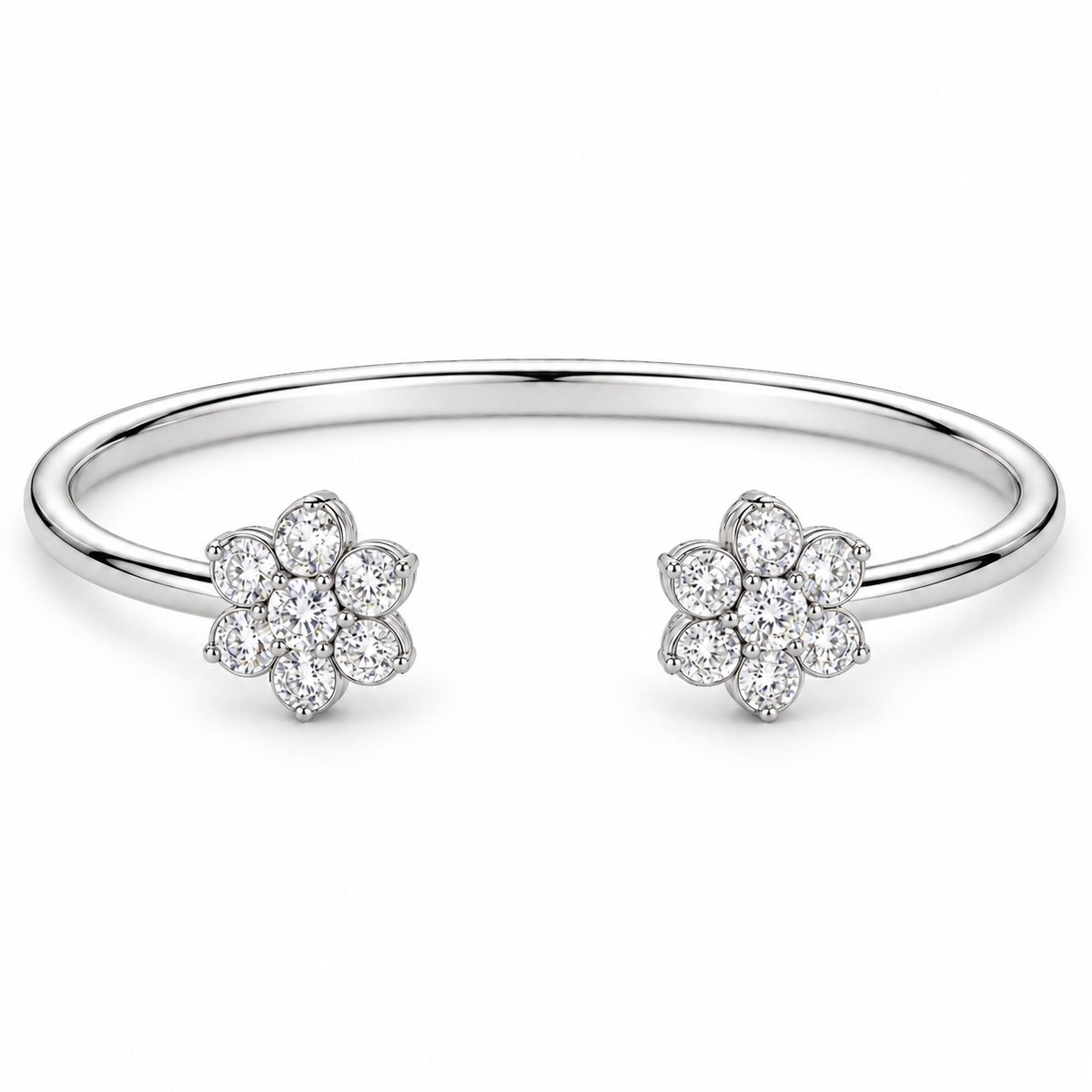 [metal:white-gold] Camellia Cuff — front — Open cuff with two floral diamond clusters, low oblique studio view [catalog-v4]