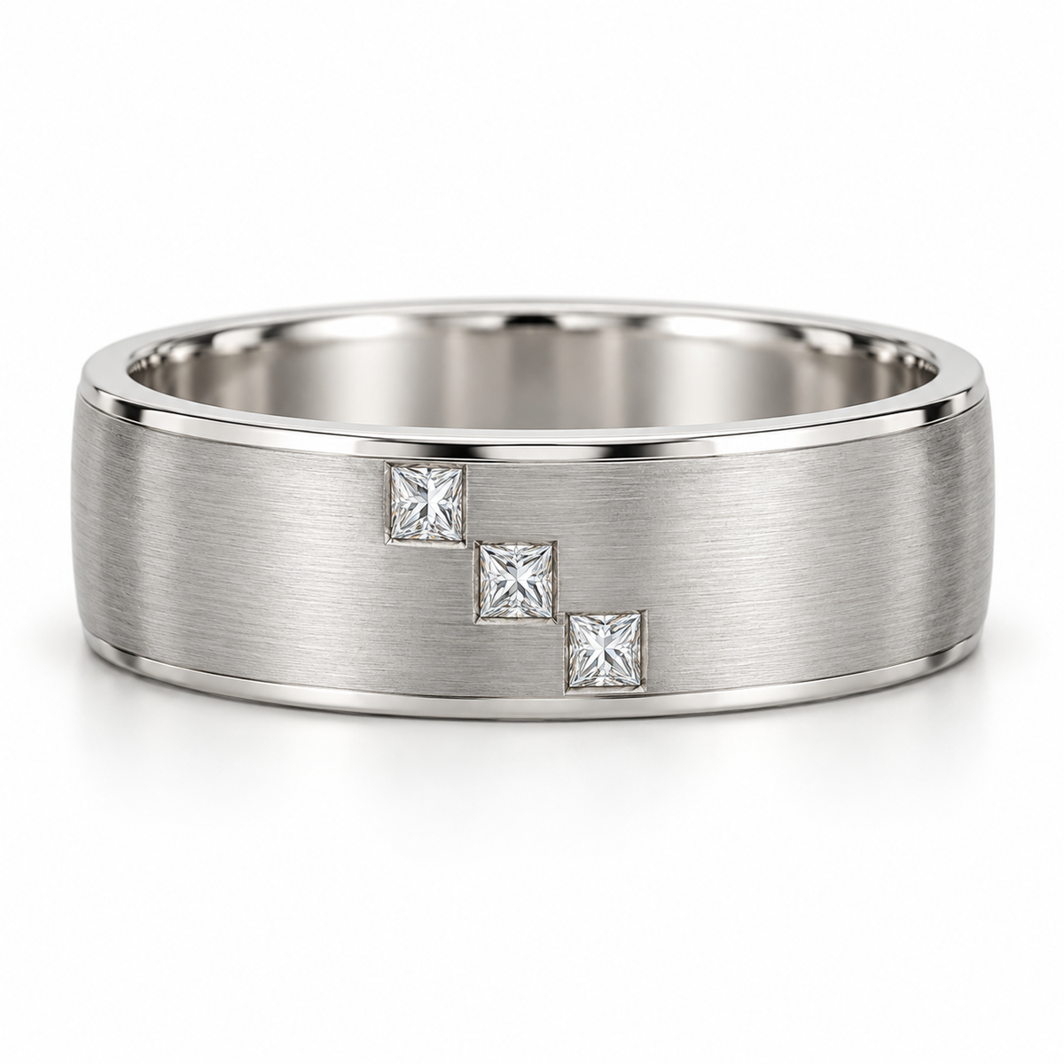[metal:white-gold] Cedric Diagonal Trio Band — front — broad brushed white gold band with exactly three small square princess diamonds flush set in a diagonal line across central front face, thin polished edges, front view [catalog-v4]
