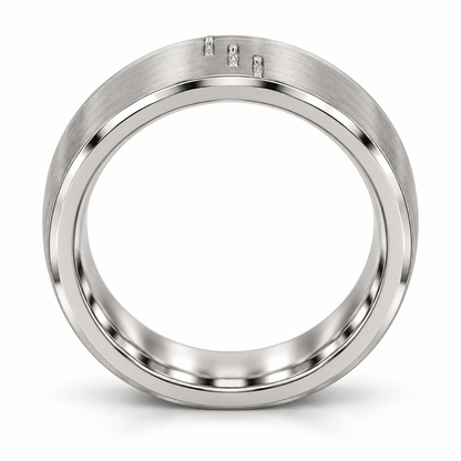 [metal:white-gold] Cedric Diagonal Trio Band — top — broad brushed white gold band with exactly three small square princess diamonds flush set in a diagonal line across central front face, thin polished edges, top view [catalog-v4]