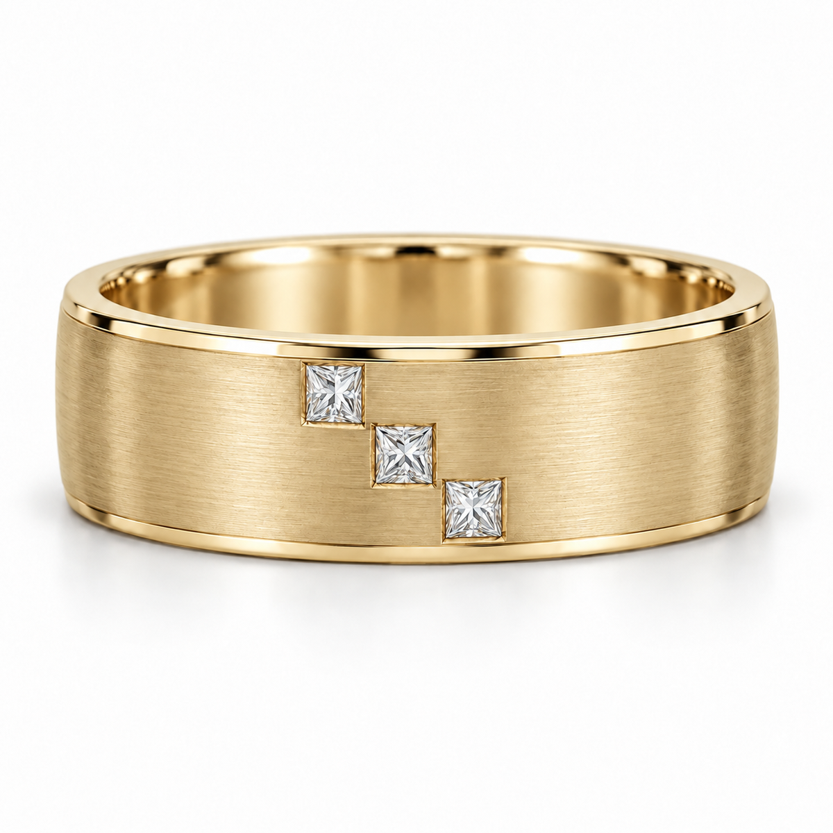[metal:yellow-gold] Cedric Diagonal Trio Band — front — broad brushed white gold band with exactly three small square princess diamonds flush set in a diagonal line across central front face, thin polished edges, front view [catalog-v4]