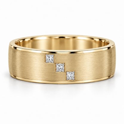 [metal:yellow-gold] Cedric Diagonal Trio Band — front — broad brushed white gold band with exactly three small square princess diamonds flush set in a diagonal line across central front face, thin polished edges, front view [catalog-v4]
