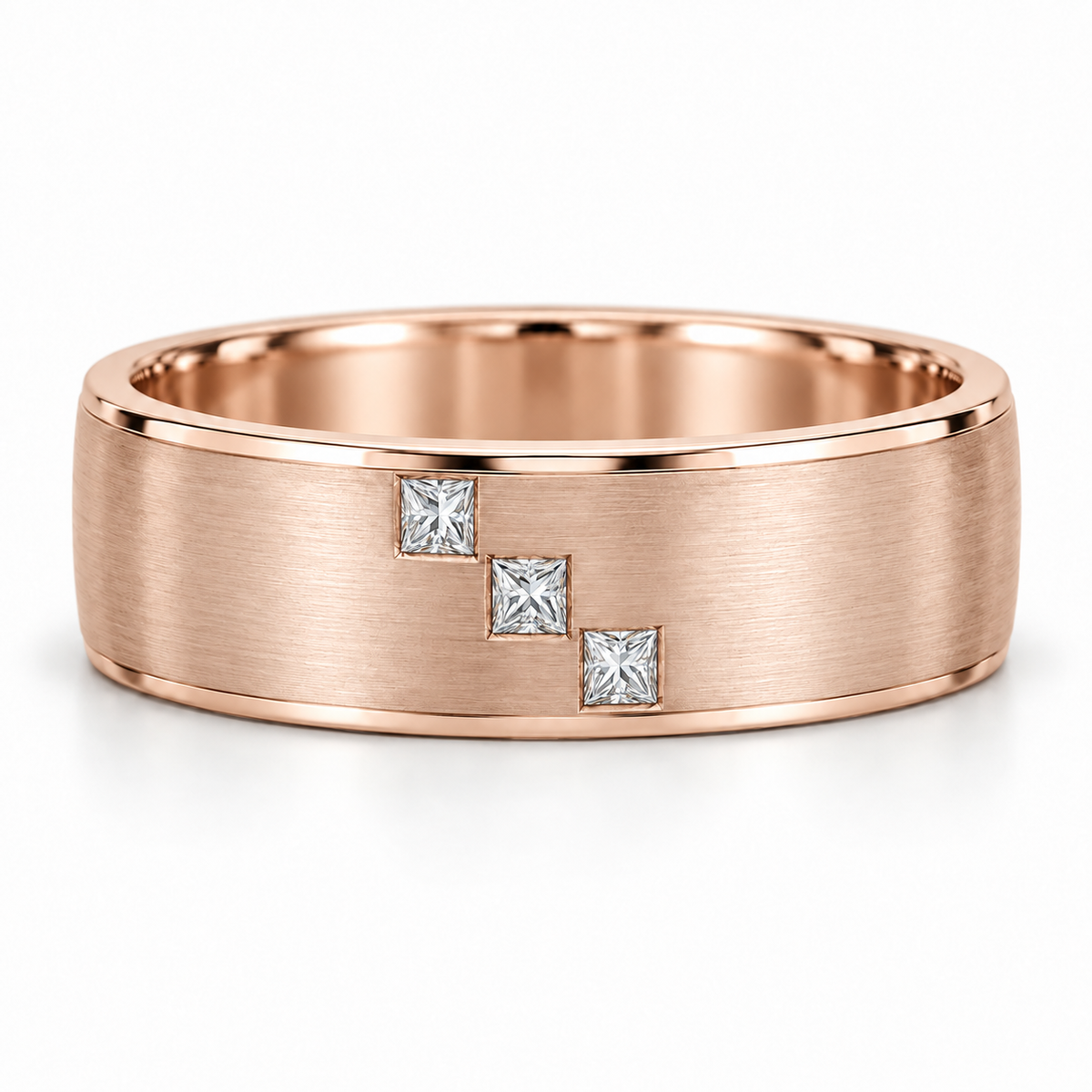 [metal:rose-gold] Cedric Diagonal Trio Band — front — broad brushed white gold band with exactly three small square princess diamonds flush set in a diagonal line across central front face, thin polished edges, front view [catalog-v4]