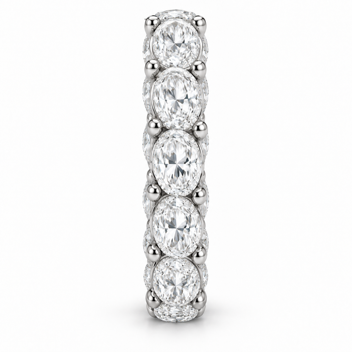 [metal:white-gold] Colette Oval Eternity Ring — side-profile — Oval diamond eternity ring, edge profile studio view [catalog-v4]