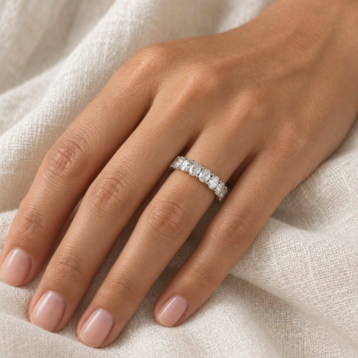 [metal:all] Colette Oval Eternity Ring — worn — Human-worn styling illustration [catalog-v4]