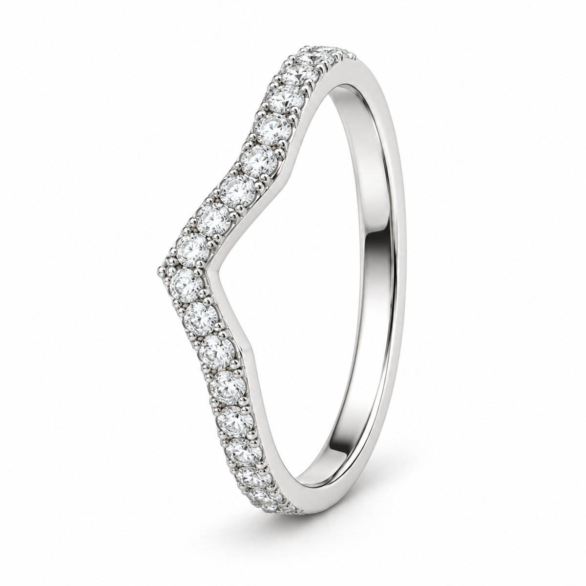 [metal:white-gold] Coraline Chevron Diamond Ring — three-quarter — Slim chevron pavé diamond band, standing oblique studio view [catalog-v4]