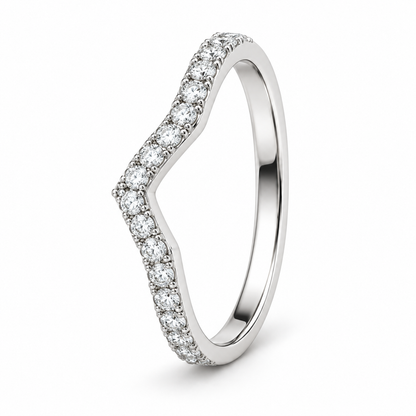 [metal:white-gold] Coraline Chevron Diamond Ring — three-quarter — Slim chevron pavé diamond band, standing oblique studio view [catalog-v4]